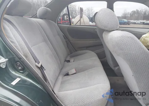 2000 Toyota Corolla Ce z USA, uszkodzony, nr VIN 2T1BR12E9YC340343